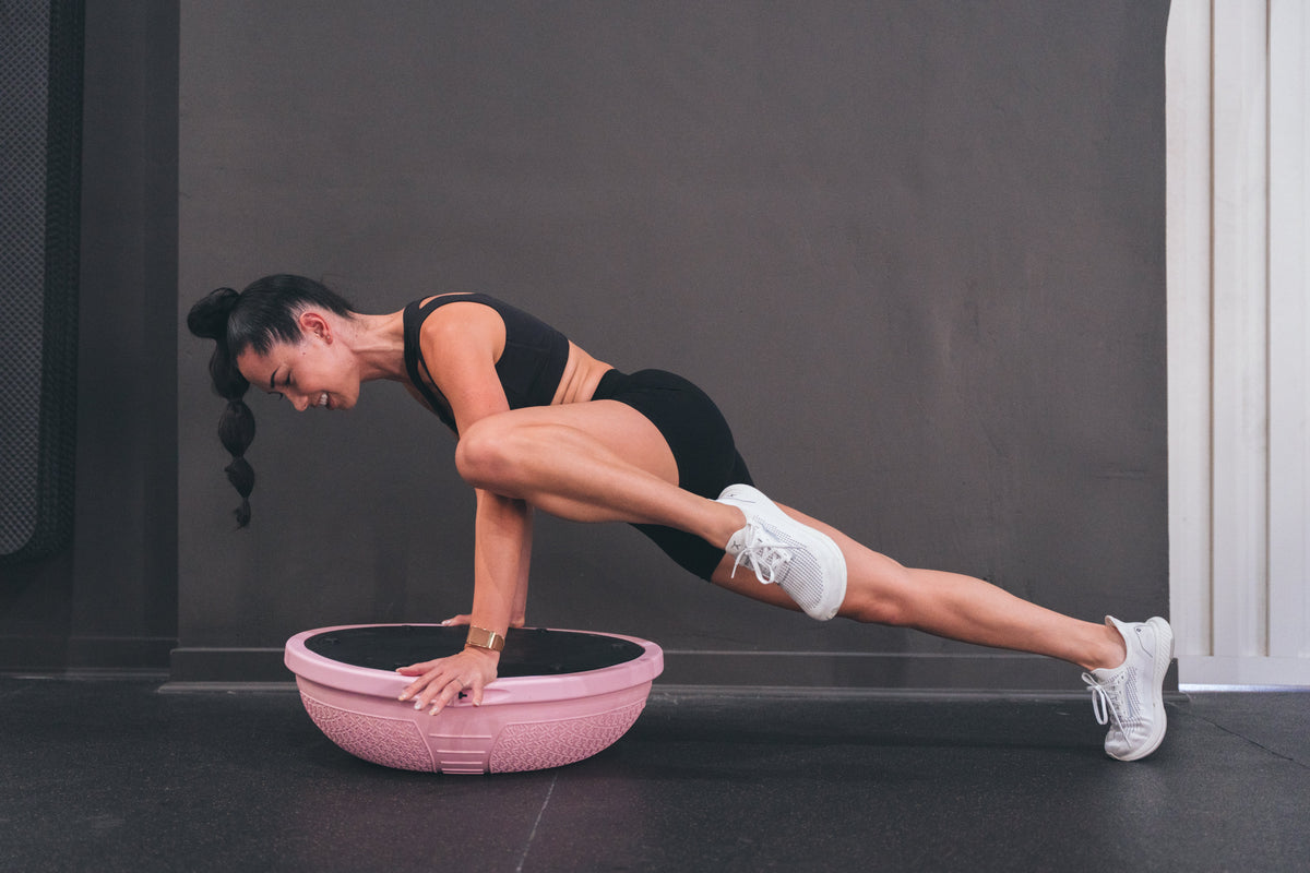 6 Swiss Ball Exercises for Back Pain Relief | BOSU